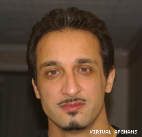 Obaid Juenda winning the award for the upcoming artist of the year in Afghanistan